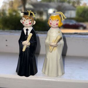Two vintage 1972 Wilton male & female graduate hard plastic cake toppers